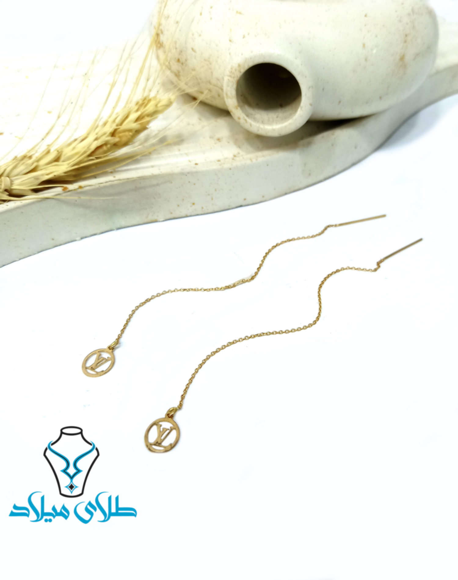 گوشواره بخیه‌ای لویی‌ویتون · گوشواره طلا