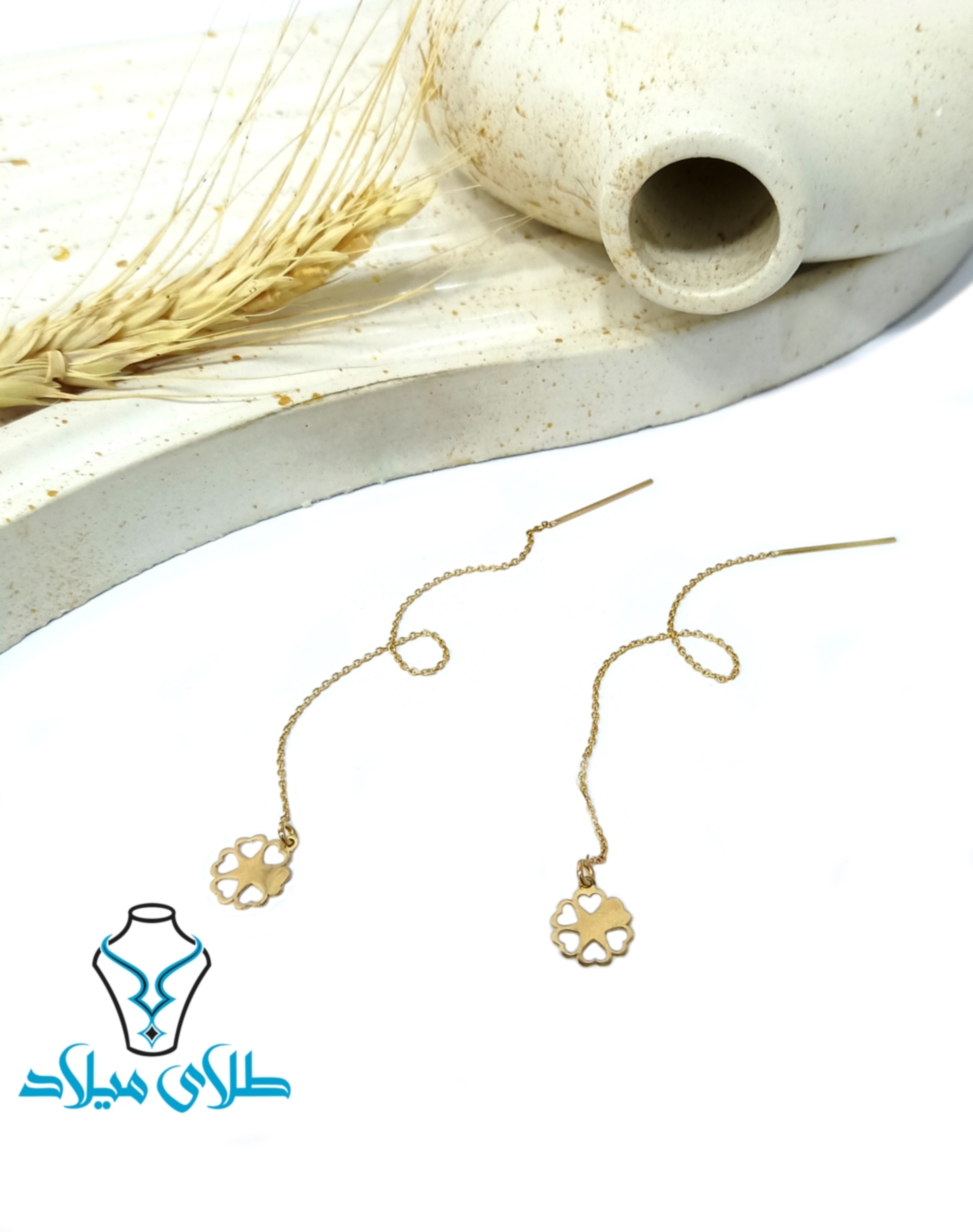 گوشواره بخیه‌ای مهگل · گوشواره طلا